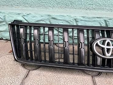 Детали электрики авто: Решетка радиатора Toyota Оригинал — 2