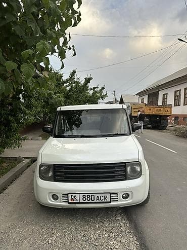 matiz diska: Nissan Cube: 2003 г., Автомат — 3