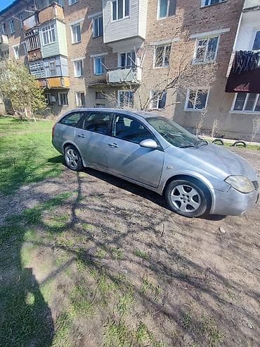 терано 1: Nissan Primera: 2004 г., 2 л, Типтроник, Газ, Универсал — 4