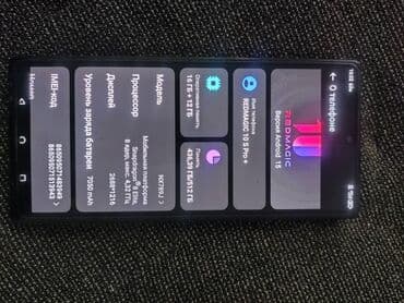 телефон продам: Многофункциональный смартфон в черном корпусе с геймерской — 1