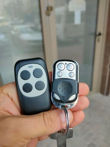 ворота с пультом: Пульты для ворот Чипы для ворот Брелки для ворот Брелоки для ворот — 5