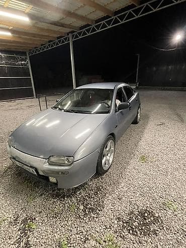 прес ош: Mazda Lantis: 1996 г., 1.5 л, Механика, Бензин, Седан — 2