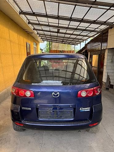 nexia r3: Mazda Demio: 2004 г., 1.5 л, Автомат, Бензин, Хэтчбэк — 5