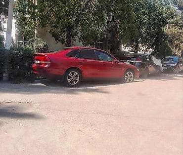 мазла: Mazda Cronos: 1996 г., 2 л, Механика, Бензин, Хэтчбэк — 3