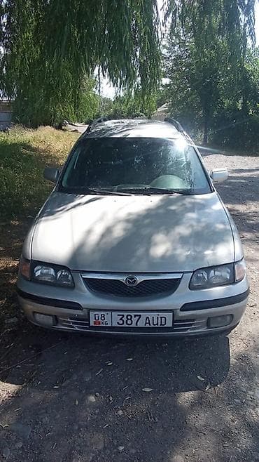 mazda 623: Mazda 323: 1999 г., Универсал — 1