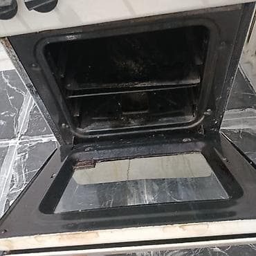 Газовая плита с духовкой, напольная. Характеристики: - 4 газовые — 2