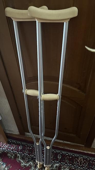 Ходунки, костыли, трости, роллаторы: Пара подмышечных костылей + фикстатор колена Orthocare Genucare — 1