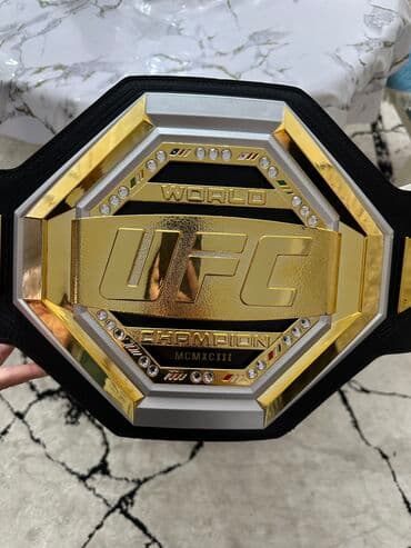 детский велосипед univega: Пояс чемпиона UFC, выполненный из черной кожи с золотыми и серебряными — 1