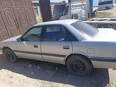 Mazda 626: 1990 г., 2.2 л, Кол менен иштөөчү, Бензин, Седан — 4