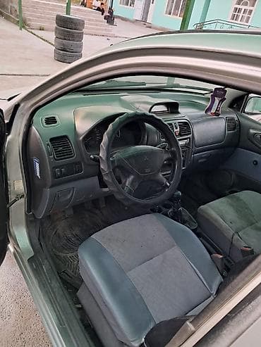 Mitsubishi Space Star: 1999 г., 1.3 л, Механика, Бензин, Универсал — 5