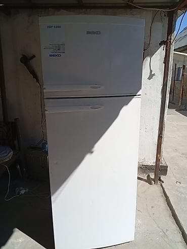 бир: Муздаткыч Beko, Колдонулган, Эки камералуу, De frost (тамчы), 70 * 180 * — 2