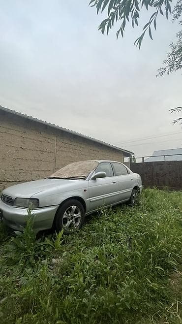 митсубиши спейс стар: Suzuki Esteem / Cultus Crescent: 1995 г., 1.5 л, Автомат, Бензин, Седан — 1