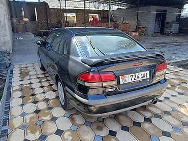 авто газ 66: Mazda 626: 1997 г., 1.8 л, Ручные, Бензин, Седан — 5