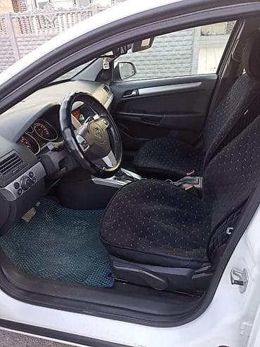 h: Opel Astra: 2011 г., 1.8 л, Автомат, Газ, Седан — 8
