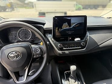 усилитель камри: Toyota Corolla: 2022 г., Вариатор, Гибрид, Седан — 6