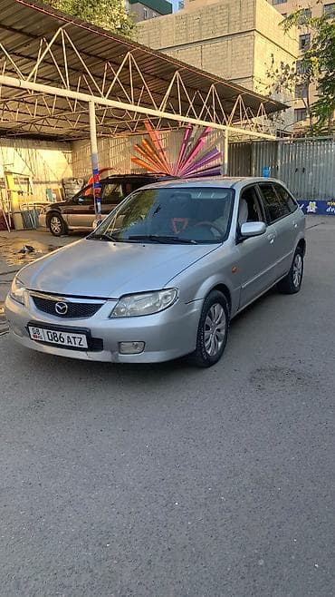 мазда мыш 323: Mazda 323: 2003 г., 1.5 л, Механика, Бензин, Универсал — 6