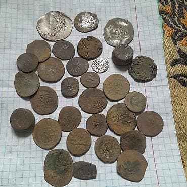 скупка старых монет: Набор старинных монет (ориентировочно восточные/исламские чеканы — 2
