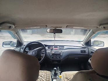 шины колеса: Mitsubishi Lancer: 2003 г., 1.6 л, Механика, Бензин, Универсал — 8