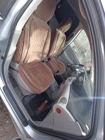 сг: Nissan Almera Tino: 2000 г., 2 л, Механика, Дизель, Минивэн — 9