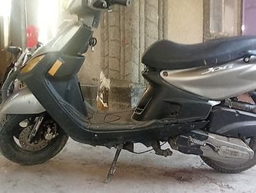 Скутеры: Скутер Yamaha Jog (серия Jog) - Кузов типа «scooter» с центральной и — 2