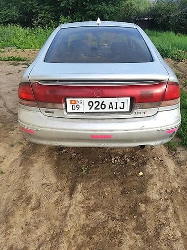 Mazda Cronos: 1997 г., 1.8 л, Кол менен иштөөчү, Бензин, Хетчбек — 8