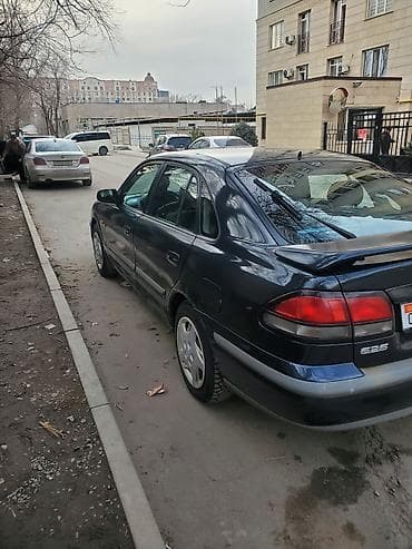 bmw e65: Mazda 626: 1997 г., 1.8 л, Механика, Бензин, Хэтчбэк — 4