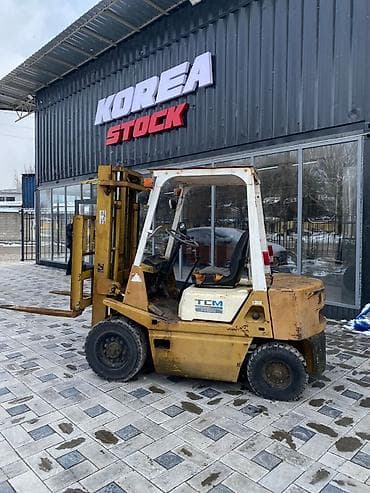 донголок погрузчик: Погрузчик, 1993 г., Колесный, Вилочный — 1