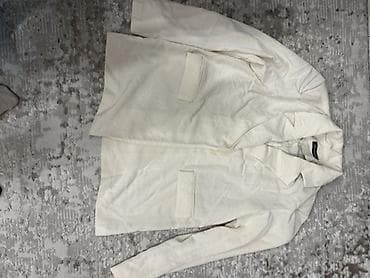 Элегантный женский блейзер кремового цвета, выполненный из мягкой