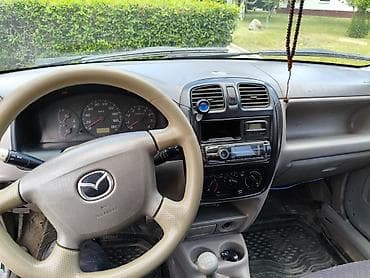 консоль 124: Mazda Demio: 2000 г., 1.3 л, Механика, Хэтчбэк — 5