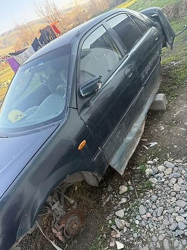 Автомобиль седан (черный), разукомплектованный, под разбор на