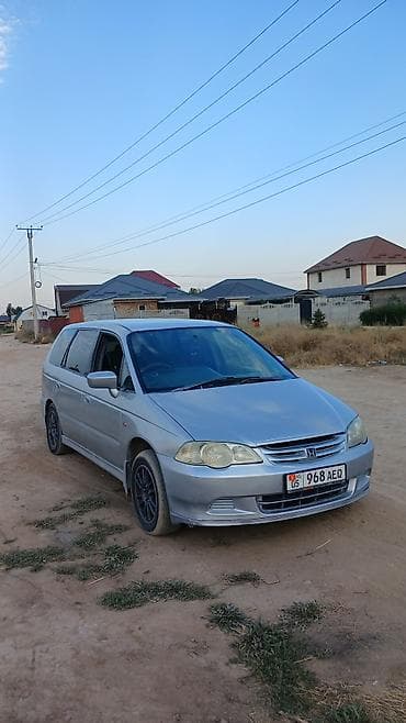 газовый коюч: Honda Odyssey: 2000 г. — 1
