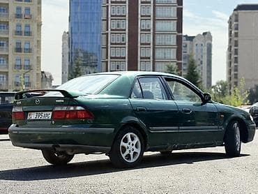 mitsubishi eclipse: Mazda 626: 1997 г., 1.8 л, Механика, Бензин, Седан — 4