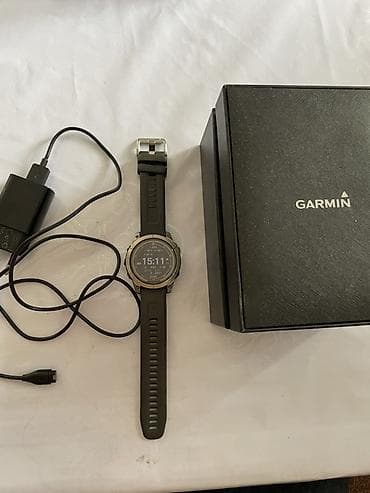 спортивные руль: Garmin Fenix 7 Sapphire Solar Комплект: - умные часы Garmin Fenix 7 — 1