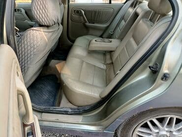 значок на авто: Nissan Primera: 2000 г., 2 л, Автомат, Бензиновая, Седан — 10