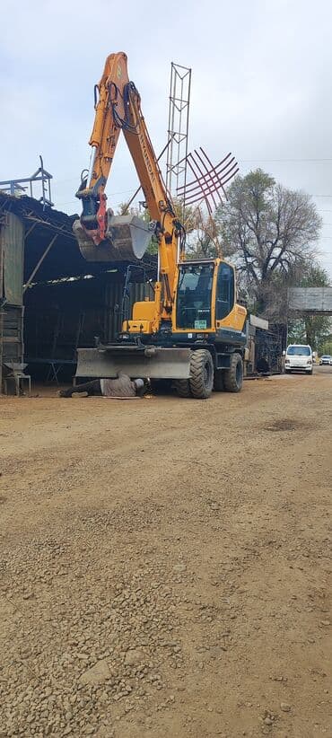 покрышка на погрузчик цена: Экскаватор, Hyundai, Колесный — 4