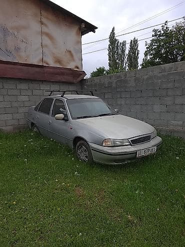 фара e34: Daewoo Nexia: 1998 г., Седан — 2