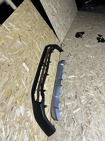 бампер малибу 2: Юбка заднего бампера Toyota, цвет - Черный — 1