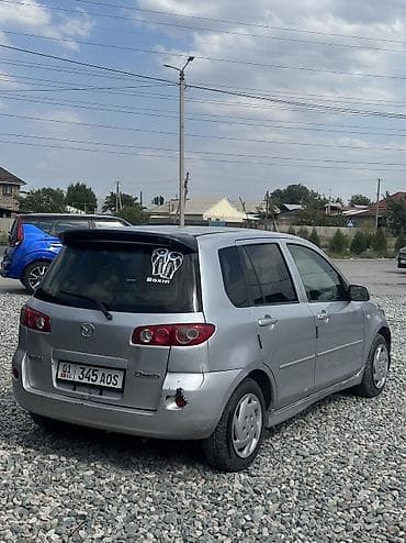 Mazda Demio: 2004 г., 1.3 л, Автомат, Газ, Хэтчбэк — 3