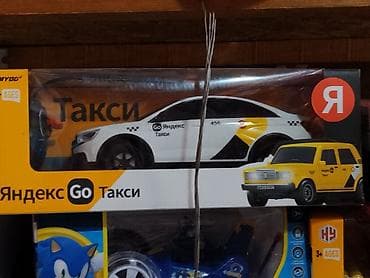 Игрушечный автомобиль «Яндекс Go Такси» в фирменной упаковке. - — 1