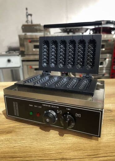 Кухонное и прачечное оборудование "KOLGU": Аппарат для приготовления корн-догов – это специальный контактный