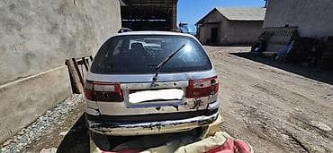 Кузовные детали: Toyota Carina универсал, серебристый, дорестайлинг (около 1996 г.) — 4