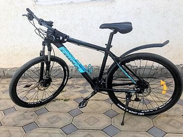 Горный велосипед 27.5" Trek (серия Marlin, черный с бирюзовым принтом) at lalafo.kg Горный велосипед 27.5" Trek (серия Marlin, черный с бирюзовым принтом)