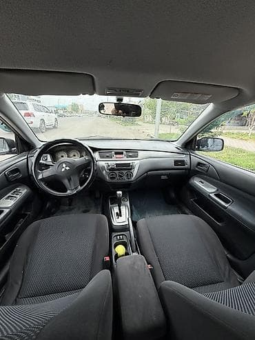 camry 2010: Mitsubishi Lancer: 2006 г., Автомат, Бензин, Седан — 7
