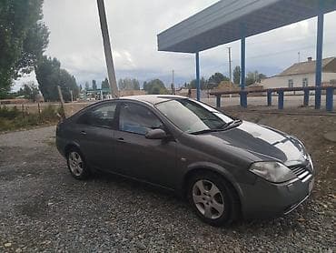sg 9: Nissan Primera: 2002 г., Бензин, Седан — 4