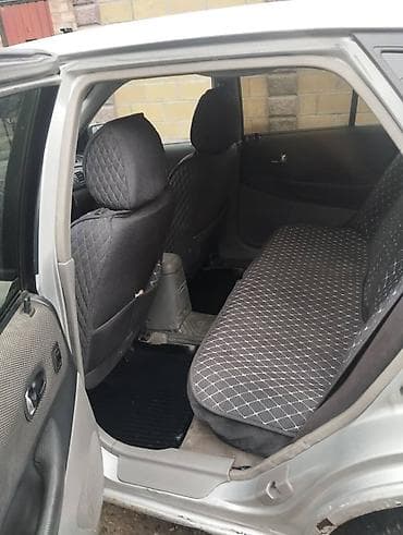 Скупка авто: Mazda 323: 2003 г., Механика, Бензин, Универсал — 6