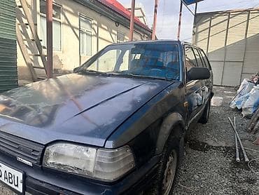 124 amg: Mazda 323: 1988 г., 1.5 л, Универсал — 3