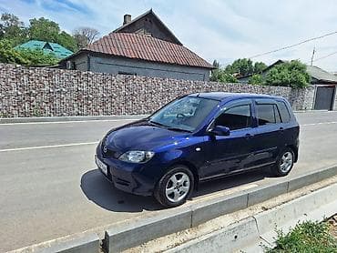 б в: Mazda Demio: 2004 г., 1.3 л, Автомат, Бензин, Хэтчбэк — 1