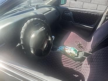 Nissan Primera: 1996 г., 2 л, Механика, Бензин, Седан — 8