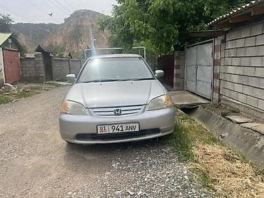 Транспорт: Honda Civic седан, поколение VII ( 2002 гг.), серебристый цвет — 1