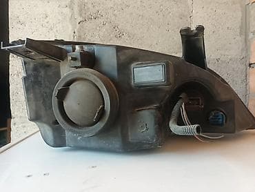 Автозапчасти: Передняя левая фара Ford 2005 г., Б/у, Оригинал, США — 4